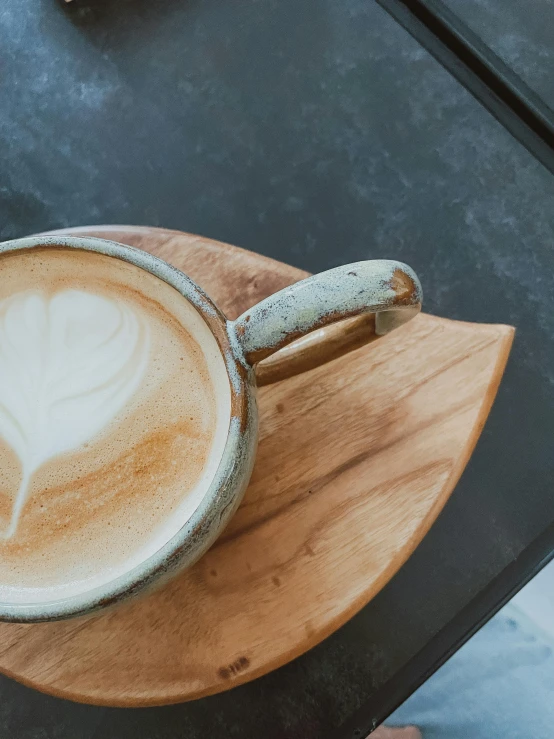 the large latte is designed to look like an abstract flower