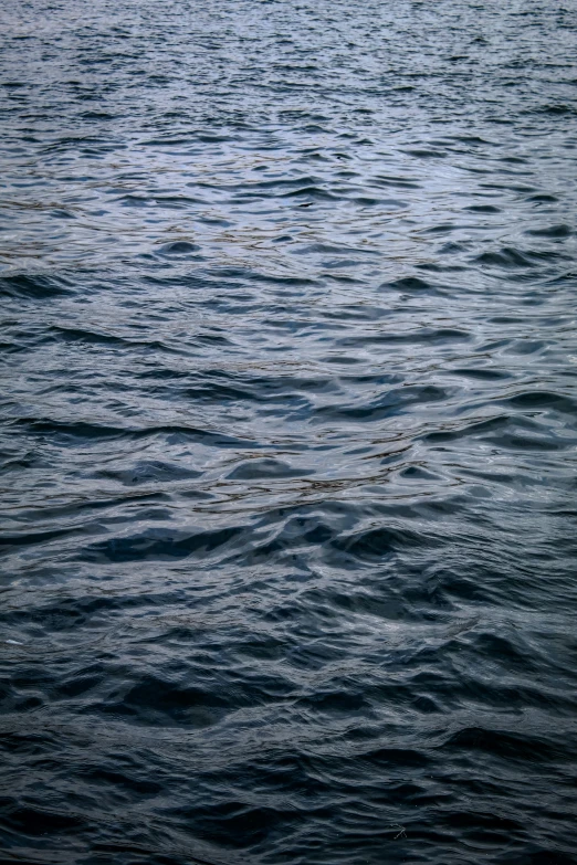 view of some ripples in the water in a body of water