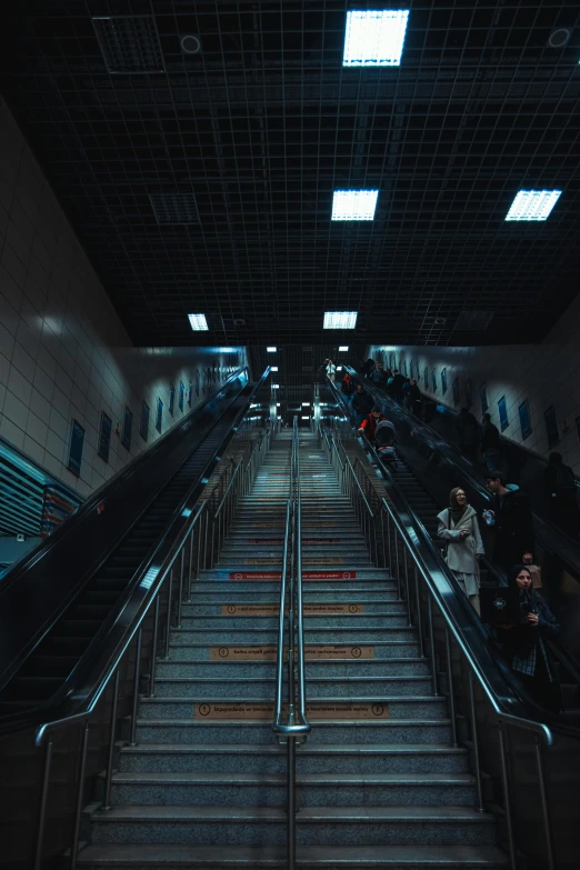 an empty escalator in a subway station