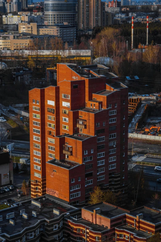 the large brick buildings have many windows on it