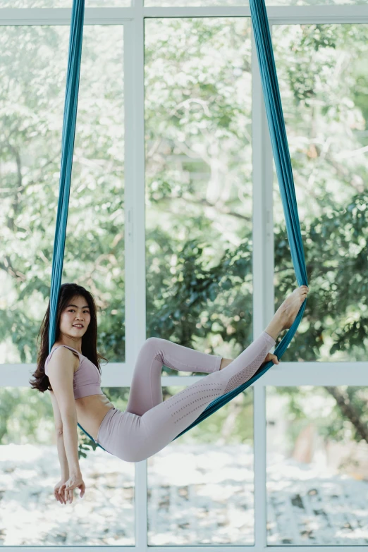 a  on a hammock swing in the air