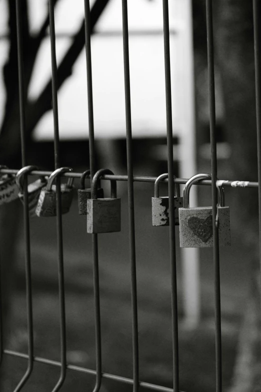 a bunch of padlocks sitting in front of a building