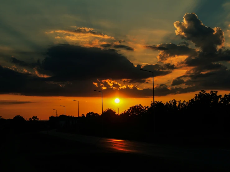 a sky that is filled with clouds during the sun