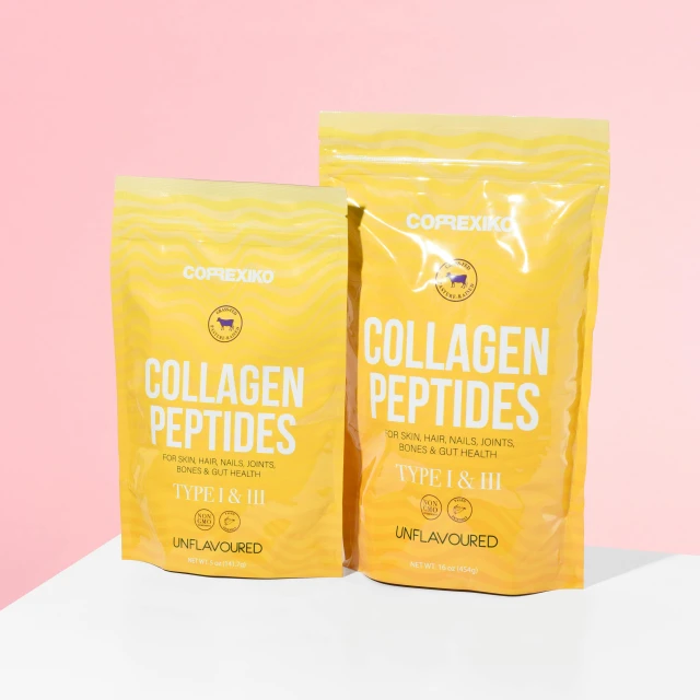 two bags of collagen peptides on a table