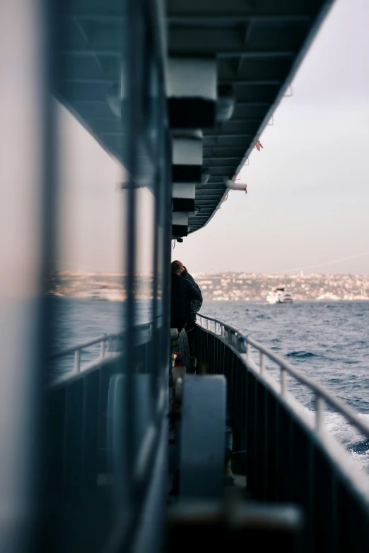 the front of a ship as seen through the bridge