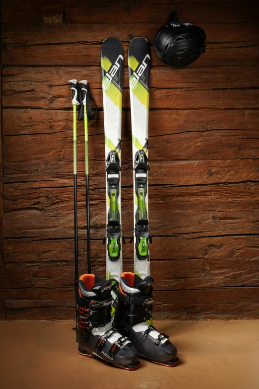 pair of skis next to backpack and snow shoes