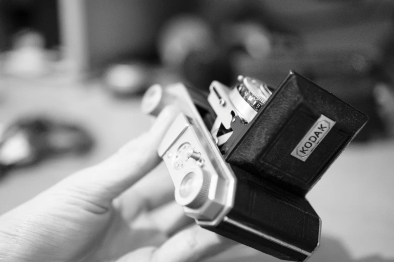 a person holding an old remote control