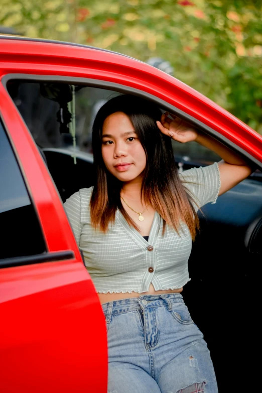 a  getting out of the car