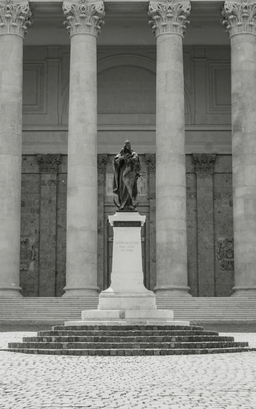 a black and white po of steps in front of an old building