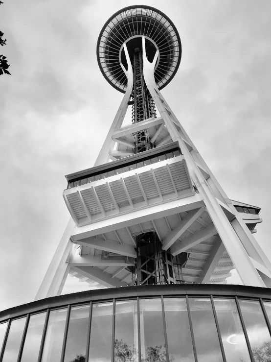 a very tall, modern building with a spire