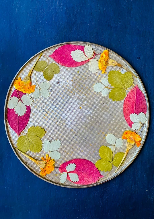 a plate with flowers painted on the bottom