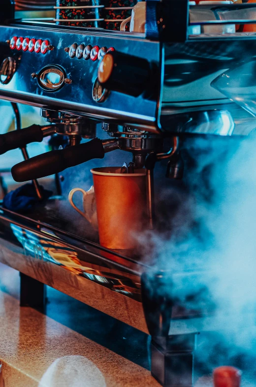 an espresso machine is full of liquid in a coffee shop