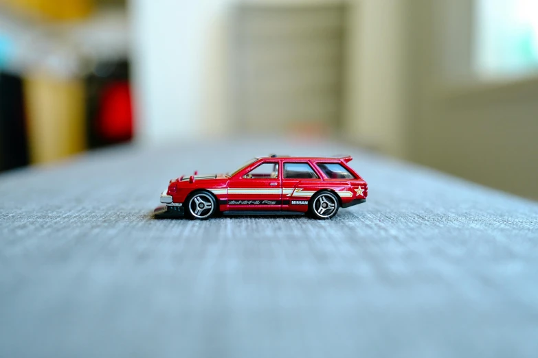 a small toy car is sitting on a table
