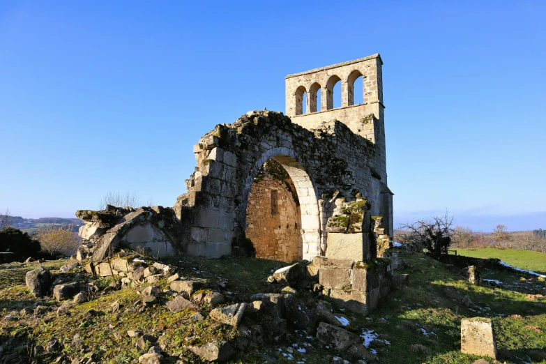 an old tower that is sitting on the ground