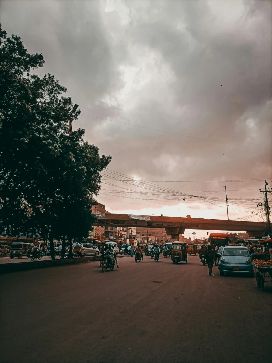 a very busy city street with cars on the road