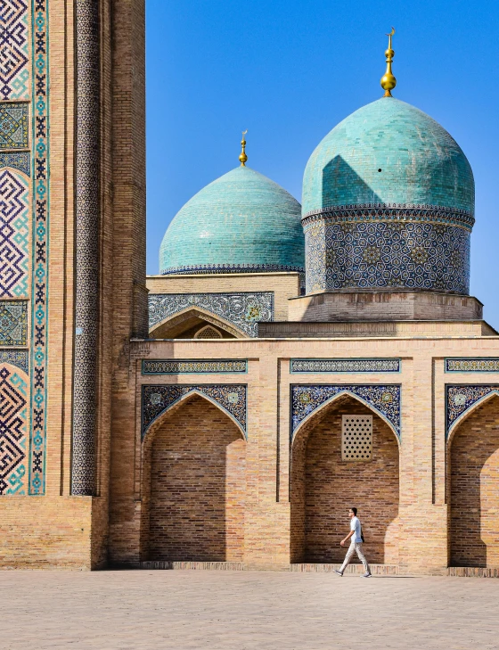 an old building with two large domes