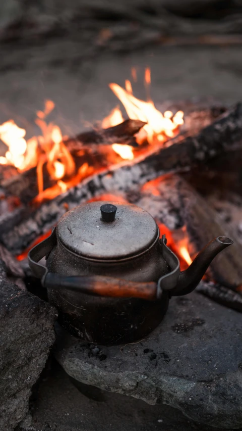 a set is being cooked over an open fire