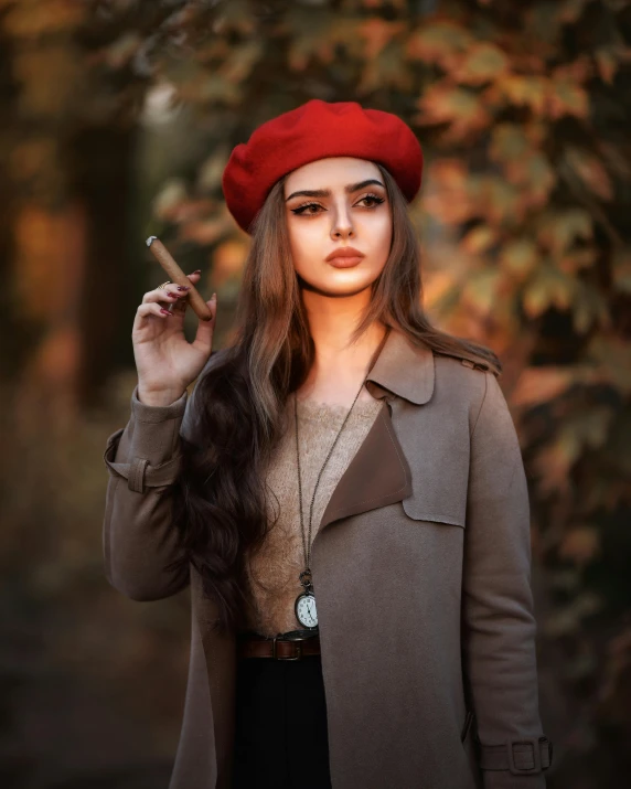 young woman wearing red beret smoking a cigarette while standing outdoors