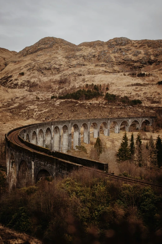 an old railway train passing through the country