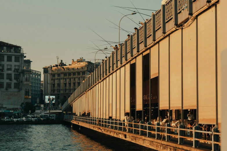 a very tall bridge with lots of people on it