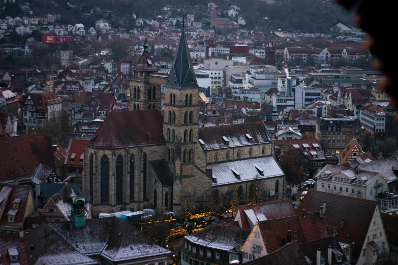 a view from above a building with an ornate roof and steeple in it