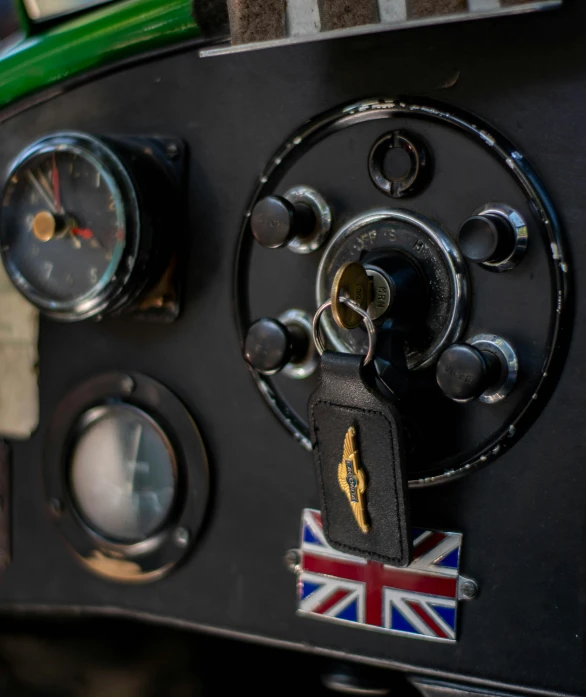 a picture of an old vehicle dashboard with various gauges and other decorations