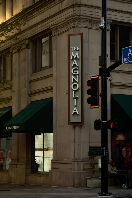 an italian restaurant on a busy city street corner