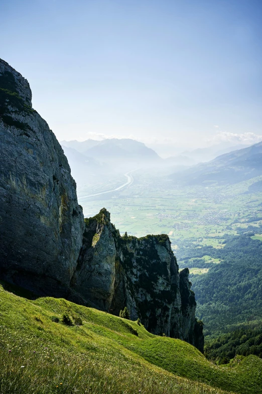 some very tall rocks in the middle of some mountains