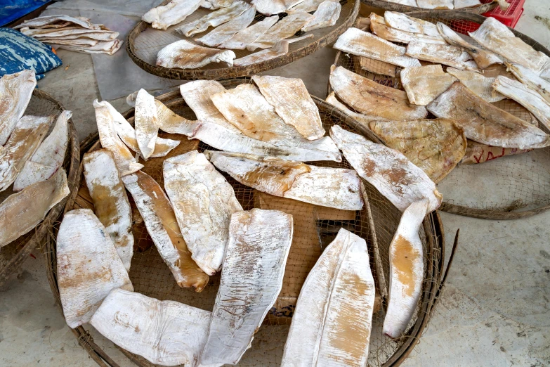 bread is on plates, and covered with powdered sugar