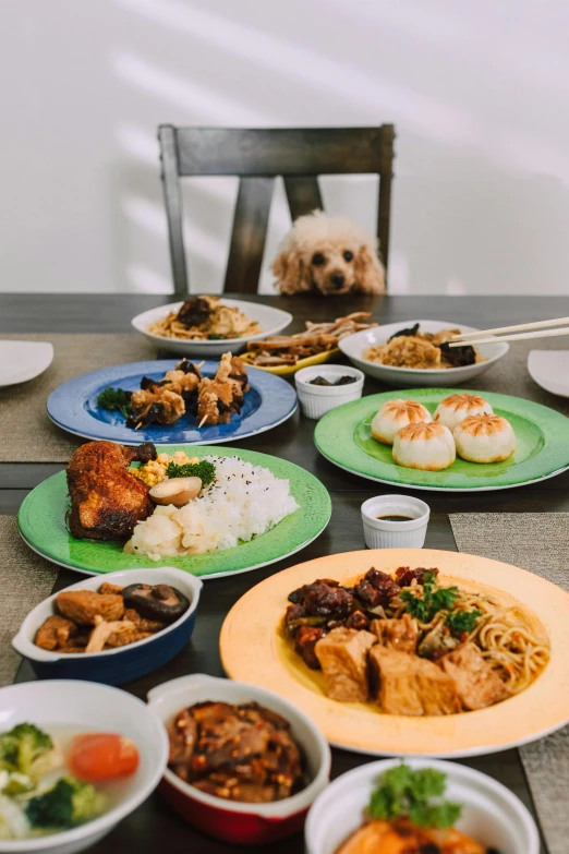 a wooden table filled with lots of food