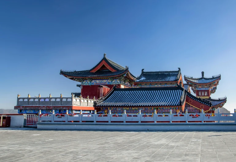 an ornate chinese building in the middle of a city