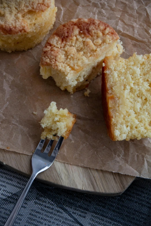 a fork is laying beside a piece of cake