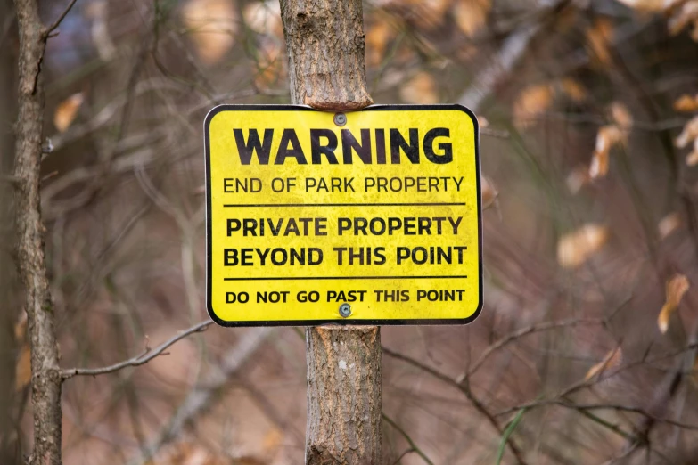 the warning sign indicates where to park property should be located