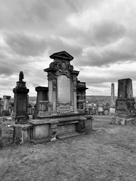 many tombstones with heads on their sides