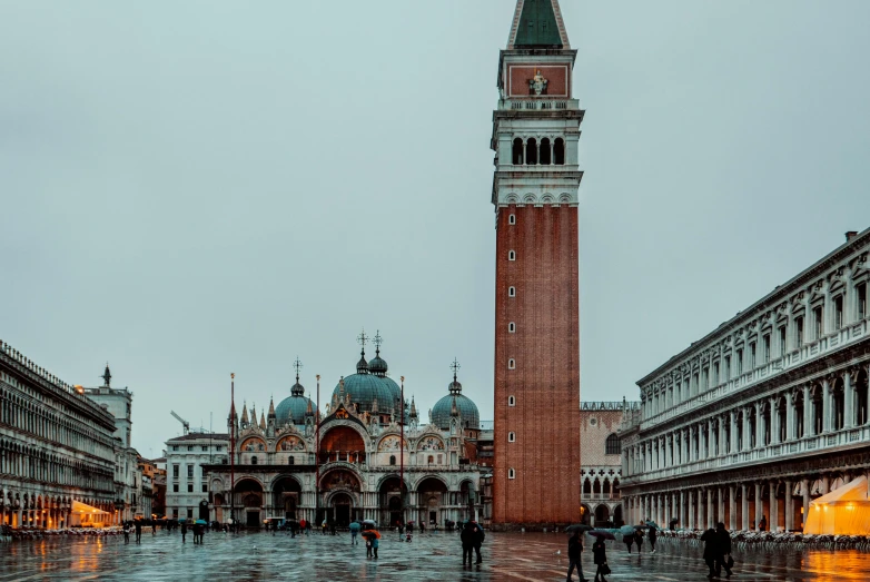 a very tall brick tower with a clock on it