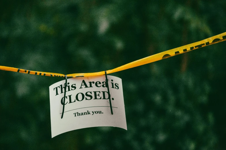 a sign is being used to direct the someone who came out of the flood