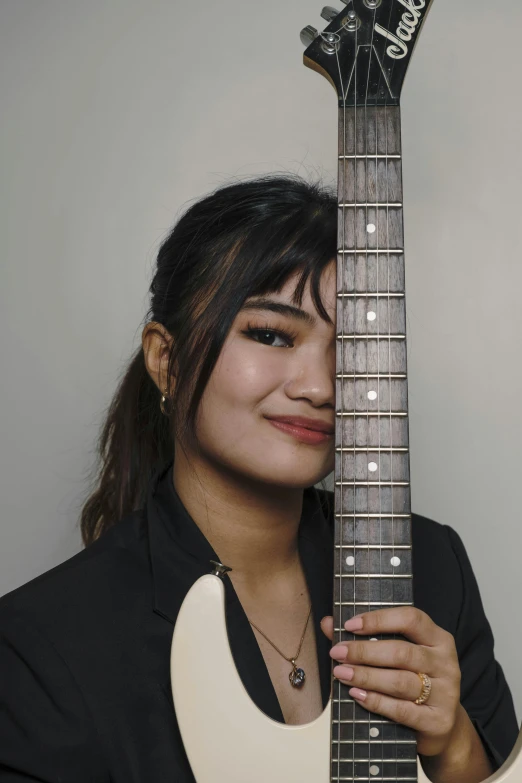 a person posing with a guitar