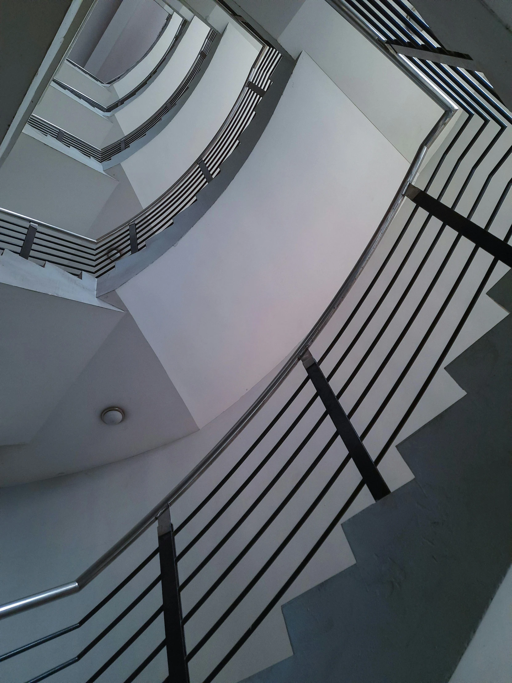 a view of a spiral staircase from above