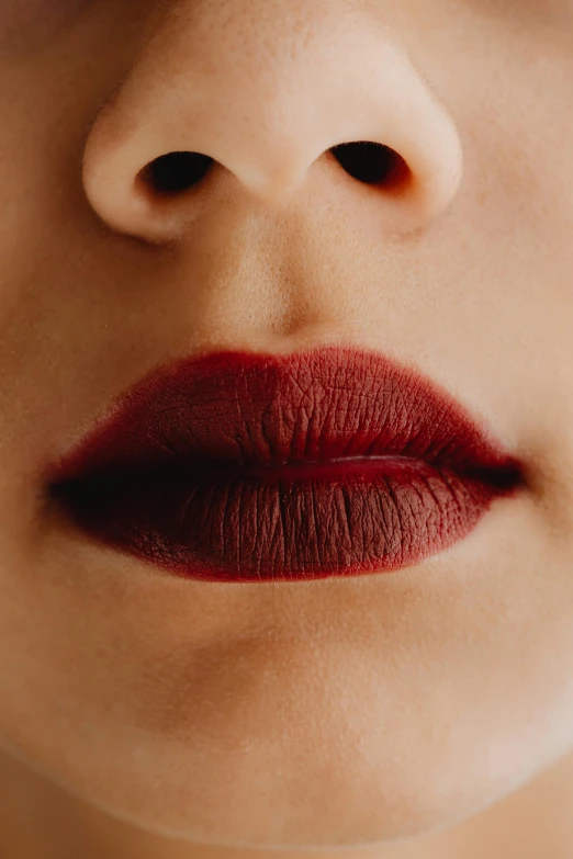 a close up s of lips with long lipstick