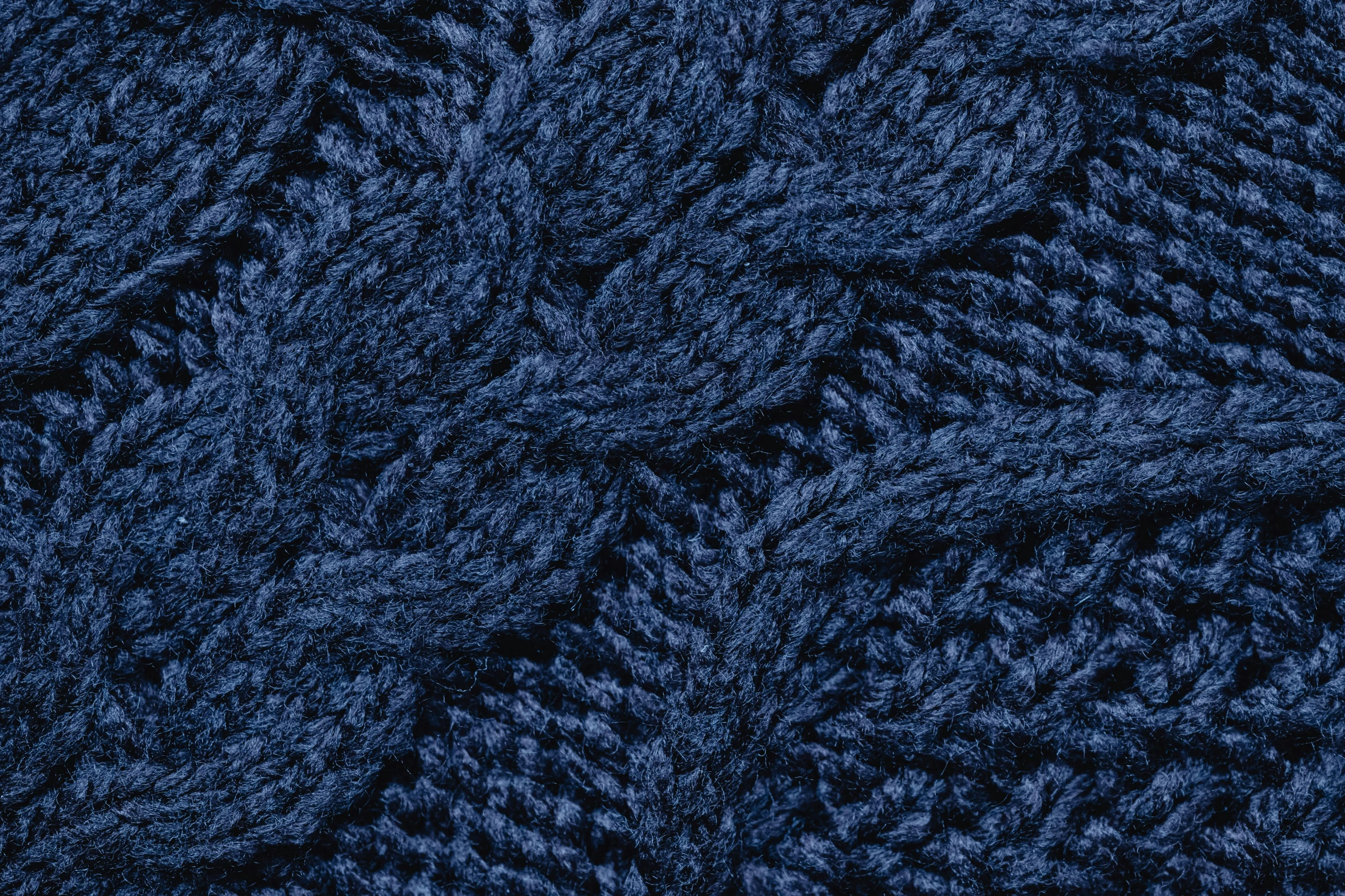 some dark blue textures of yarn with ridges