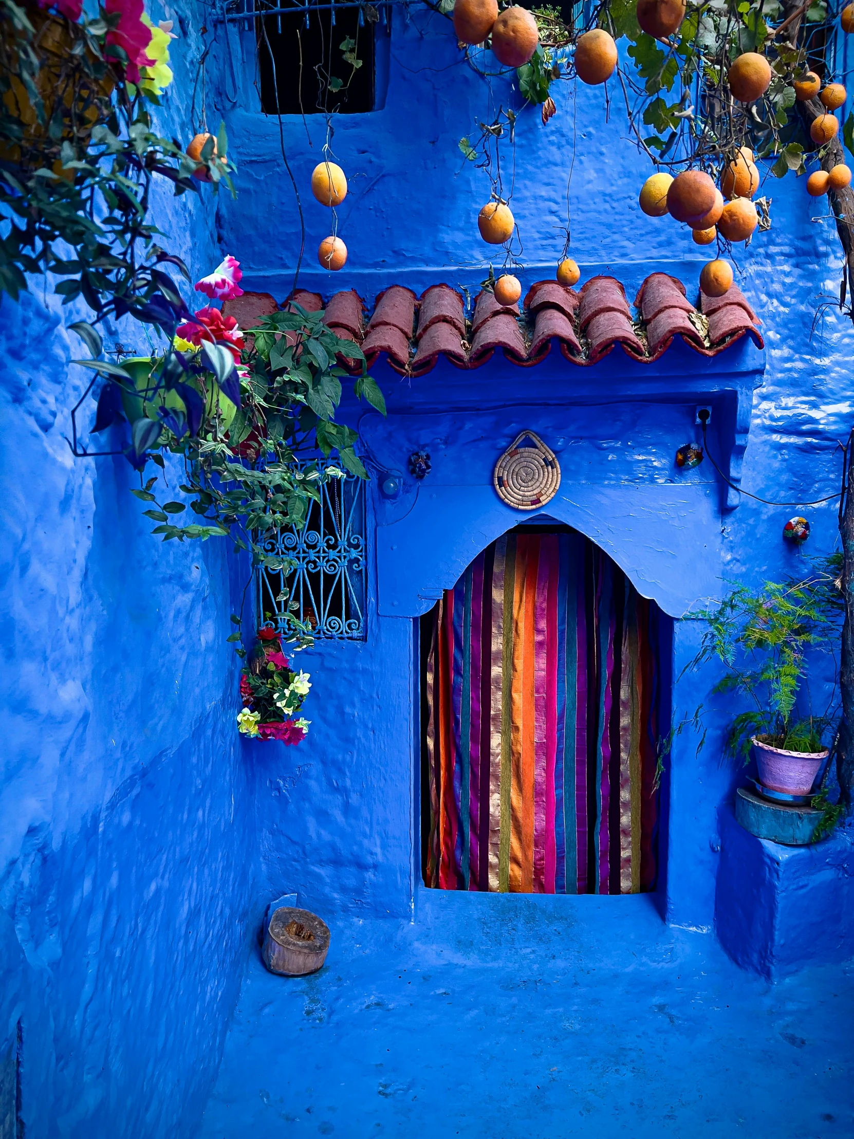 an image of a brightly colored building and courtyard