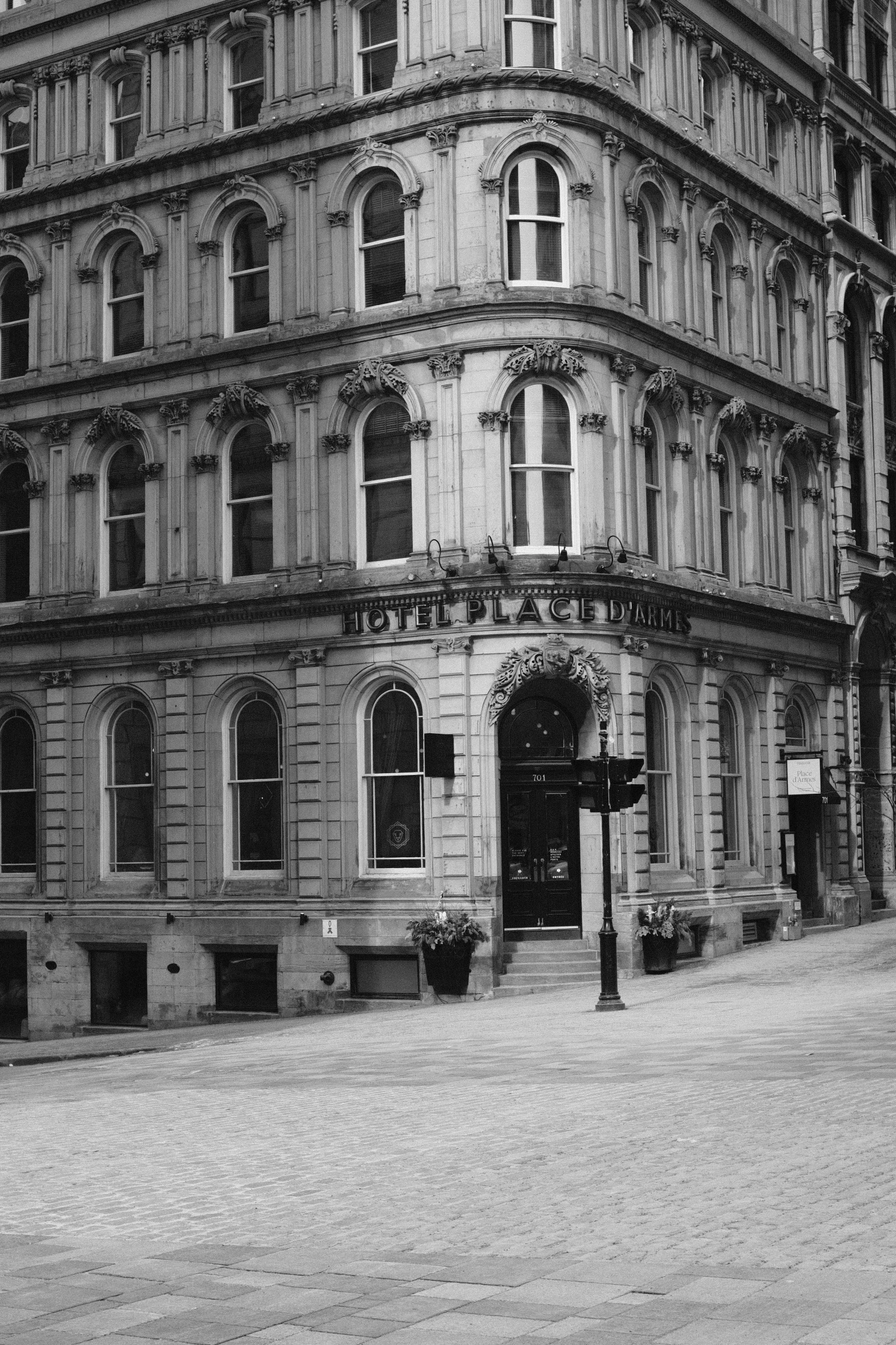 a black and white image of an old stone building