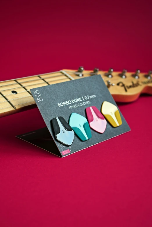 a guitar pin set showing the pickup s