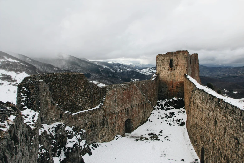 a snow covered castle with lots of snow