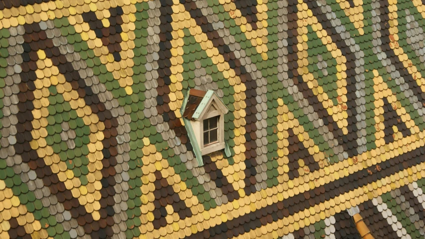 a clock sits on a wall made out of coins