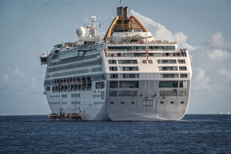 there is a large cruise ship that is anchored at the port