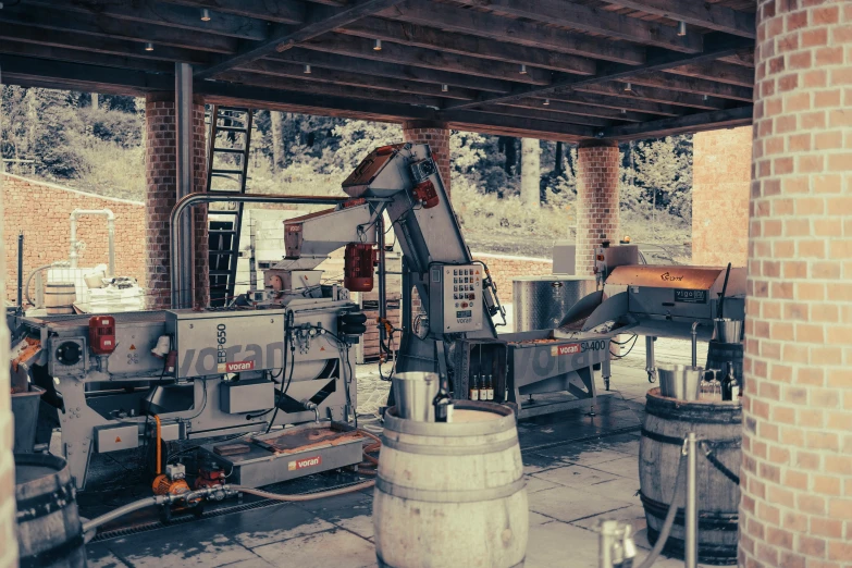 a large metal thing sitting under a roof