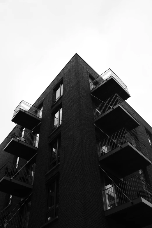 a tall building with balconies and a balcony