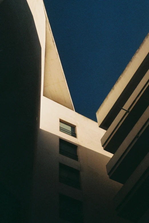 view of the corner and side of a building against the sky