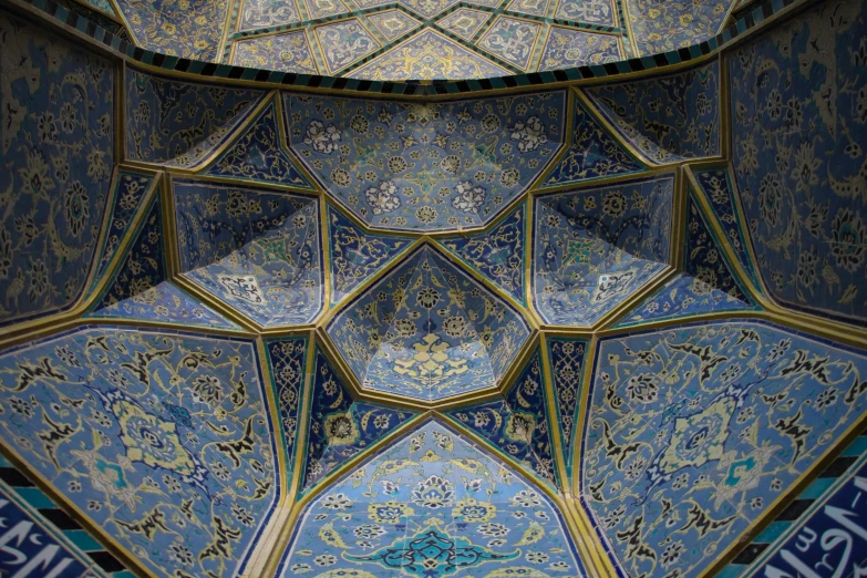 intricately detailed patterns on the ceiling in a building